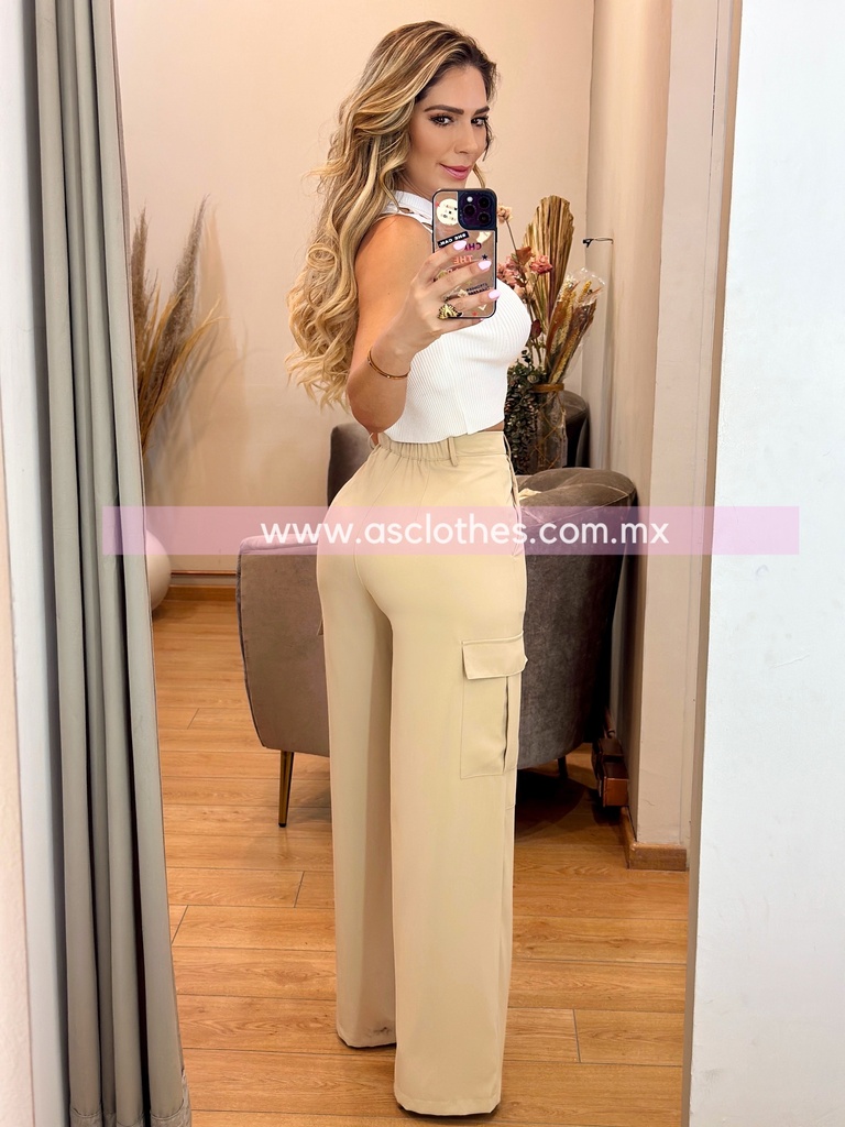 BLUSA TEJIDA SIN MANGA CON ORIFICIOS